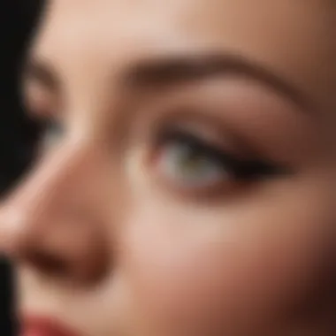 Close-up of false eyelashes being applied with precision