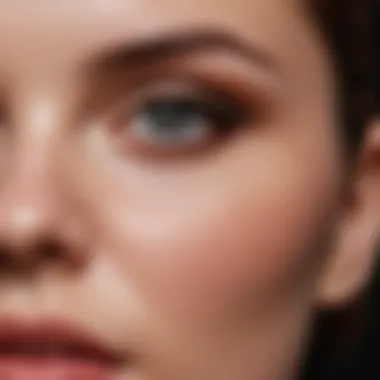 Close-up of a brush applying Cody makeup, highlighting the technique and precision involved.