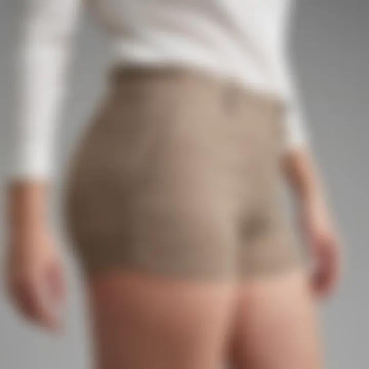 Side profile of model wearing Everlane Curvy Shorts