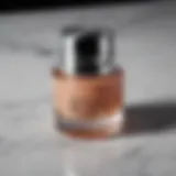 Close-up of Lancôme Dark Spot Corrector on a marble surface