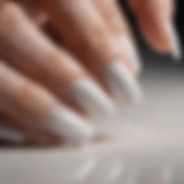 Lustrous Sparkle: The Allure of White Gel Polish Lush sparkly white gel polish on a pristine nail.
