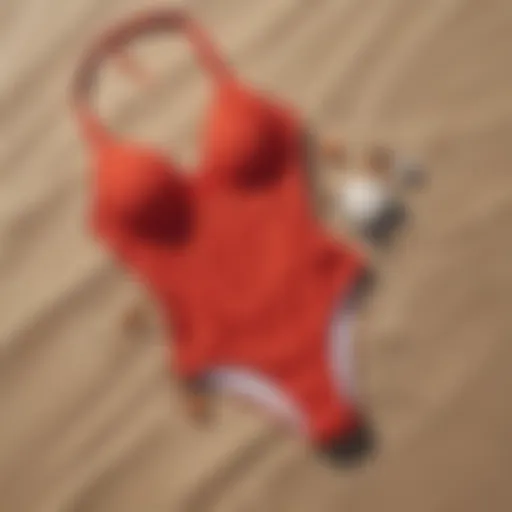 Elegant red high cut swimwear on a sandy beach