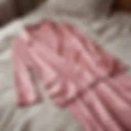 Elegant satin summer pyjamas displayed on a soft, inviting bed.