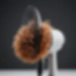 A close-up of a hair diffuser attached to a hair dryer, showcasing its unique shape.