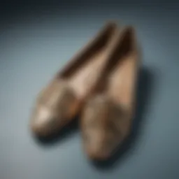 Elegant Tory Burch flats showcasing a wide width design with intricate detailing.