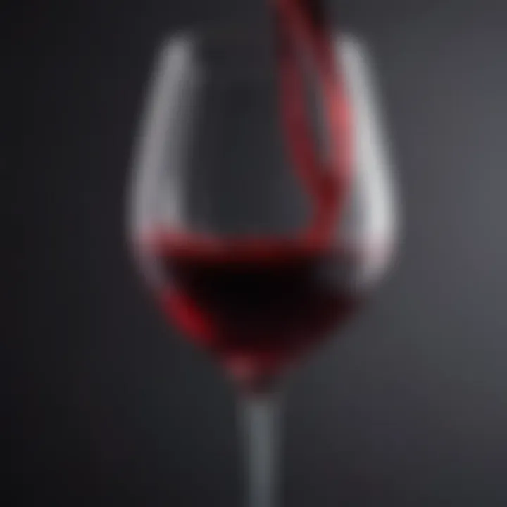 Close-up of a wine glass filled with deep red wine