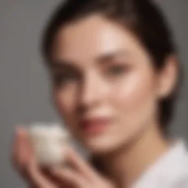 Woman applying Olay night cream in evening routine