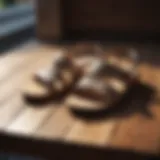 Elegant summer sandals on a wooden deck