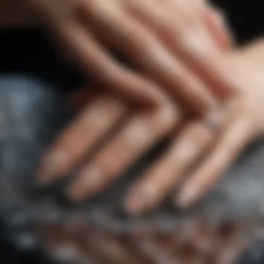 A close-up view of natural gel manicure showcasing intricate nail art designs.