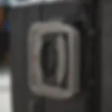 Close-up view of the Calpak suitcase lock mechanism