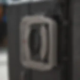 Close-up view of the Calpak suitcase lock mechanism