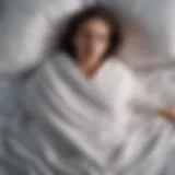 A person tangled in bed sheets, illustrating the struggle of recurring nightmares.