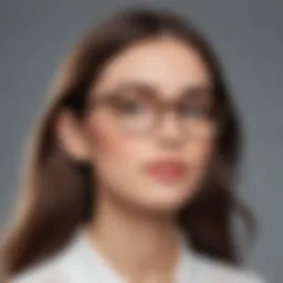 Elegant pair of Warby Parker Elise eyeglasses on a minimalist background